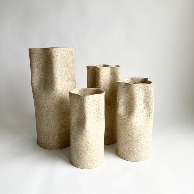 Ceramic vase in sandy speckled finish