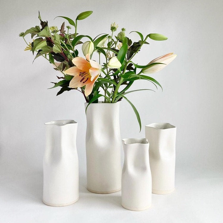 Ceramic pinched white vase with satin finish