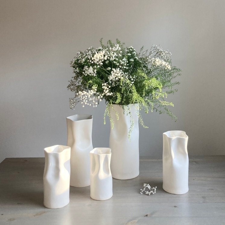 Ceramic pinched white vase with satin finish