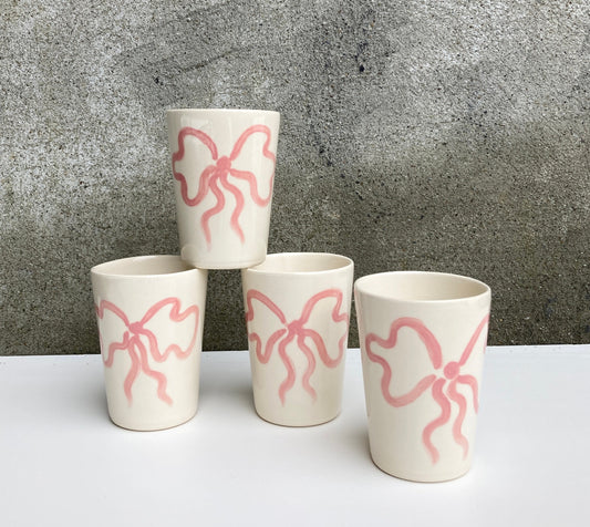 Ceramic cup with pink bow