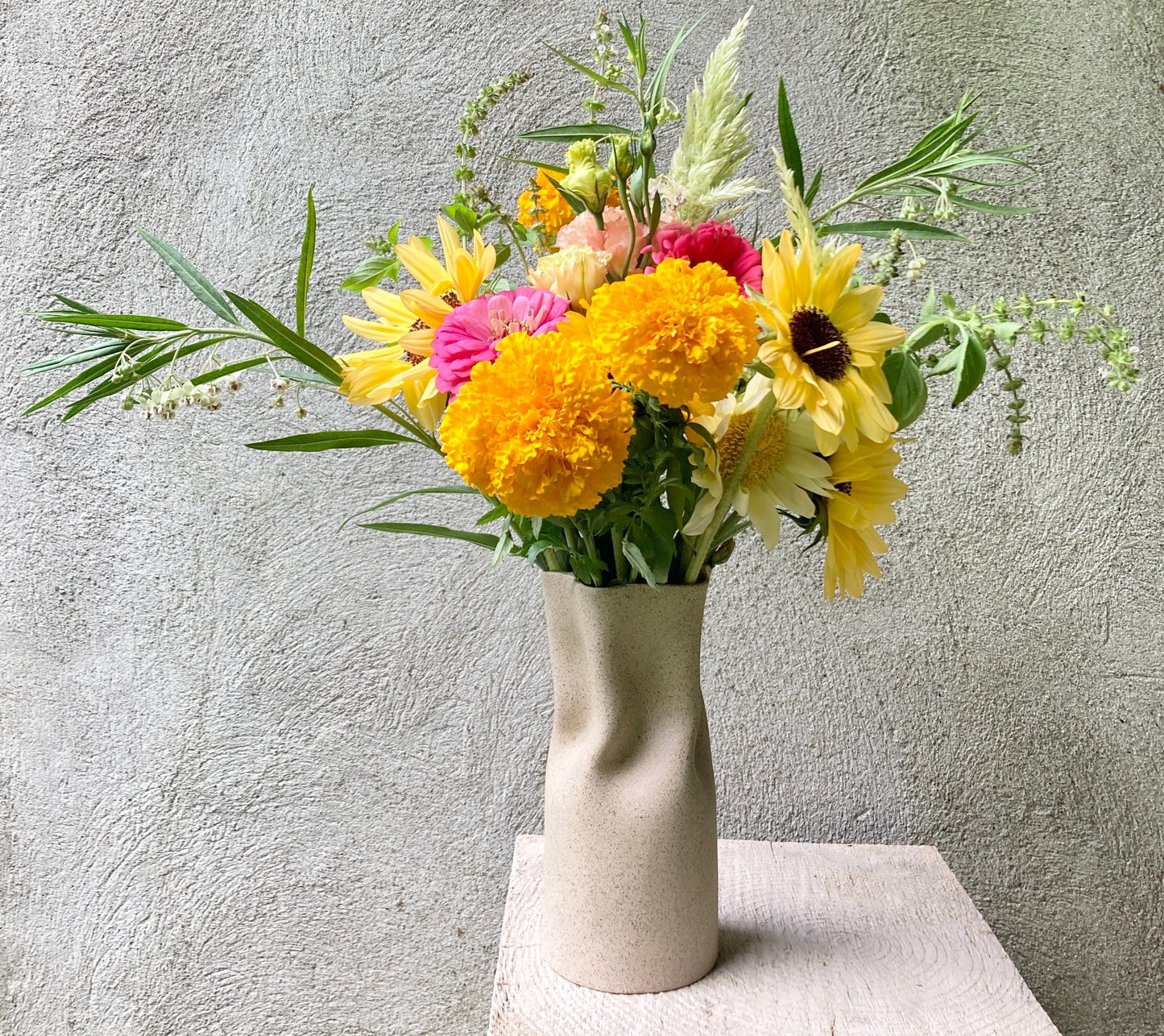 Ceramic vase in sandy speckled finish