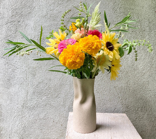 Ceramic vase in sandy speckled finish