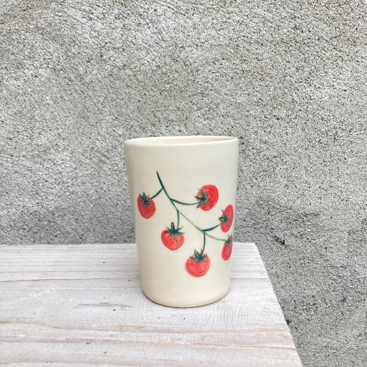 Handpainted ceramic cup with tomatoes