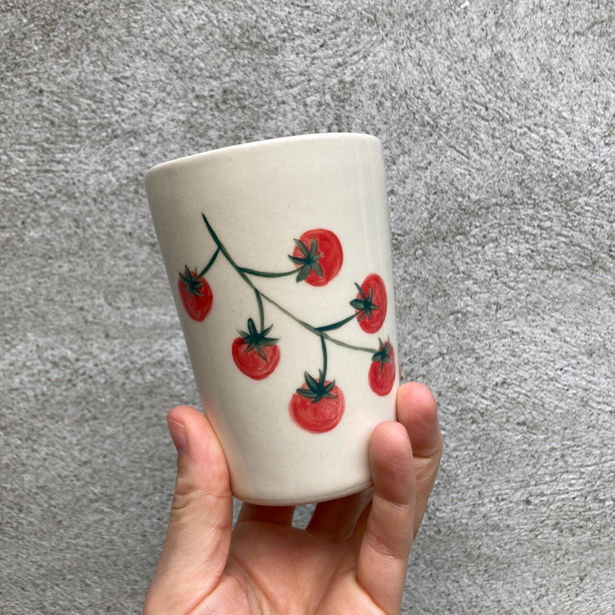 Handpainted ceramic cup with tomatoes